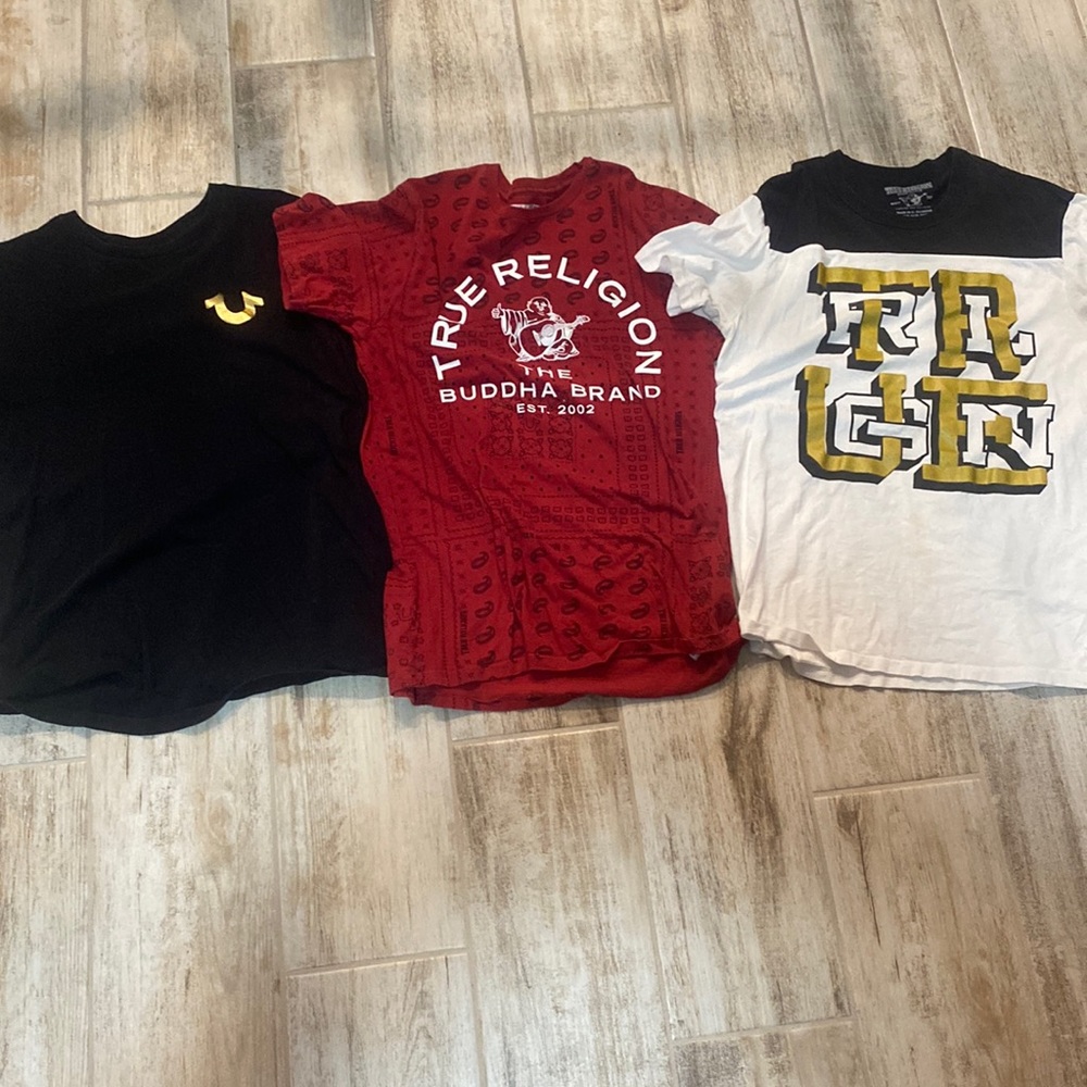 3 True Religion Shirts and will b $60 each if sold separately or $100 for all 3